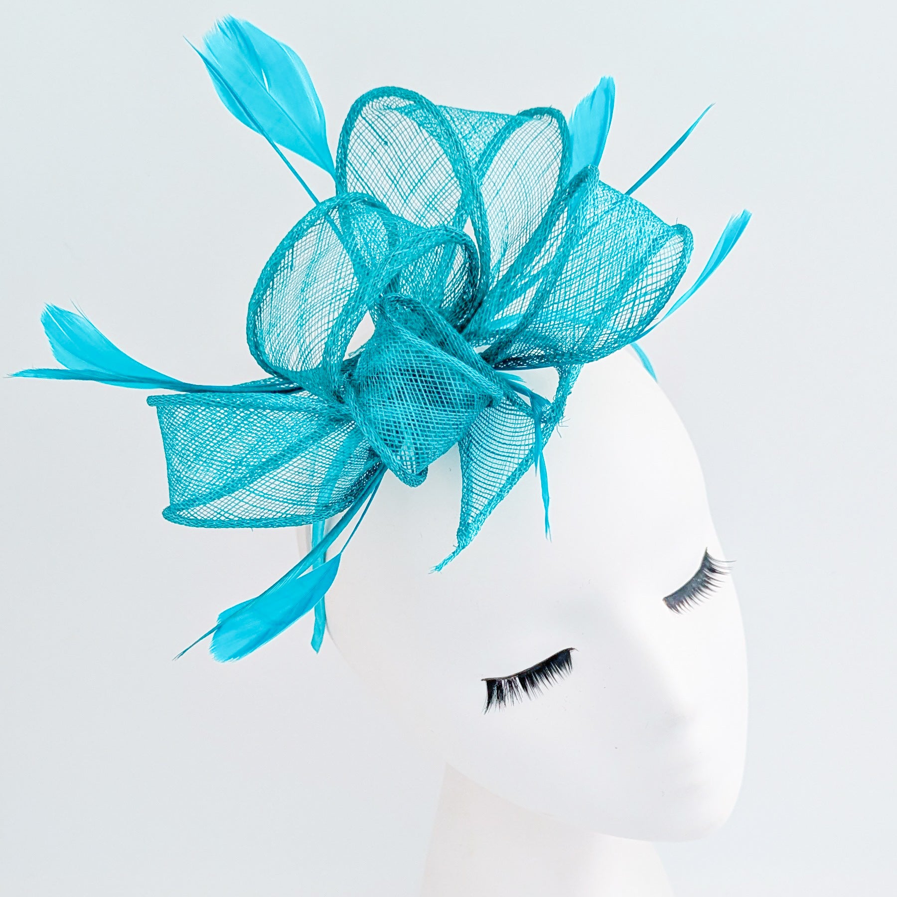 Dark acqua blue feather fascinator hat
