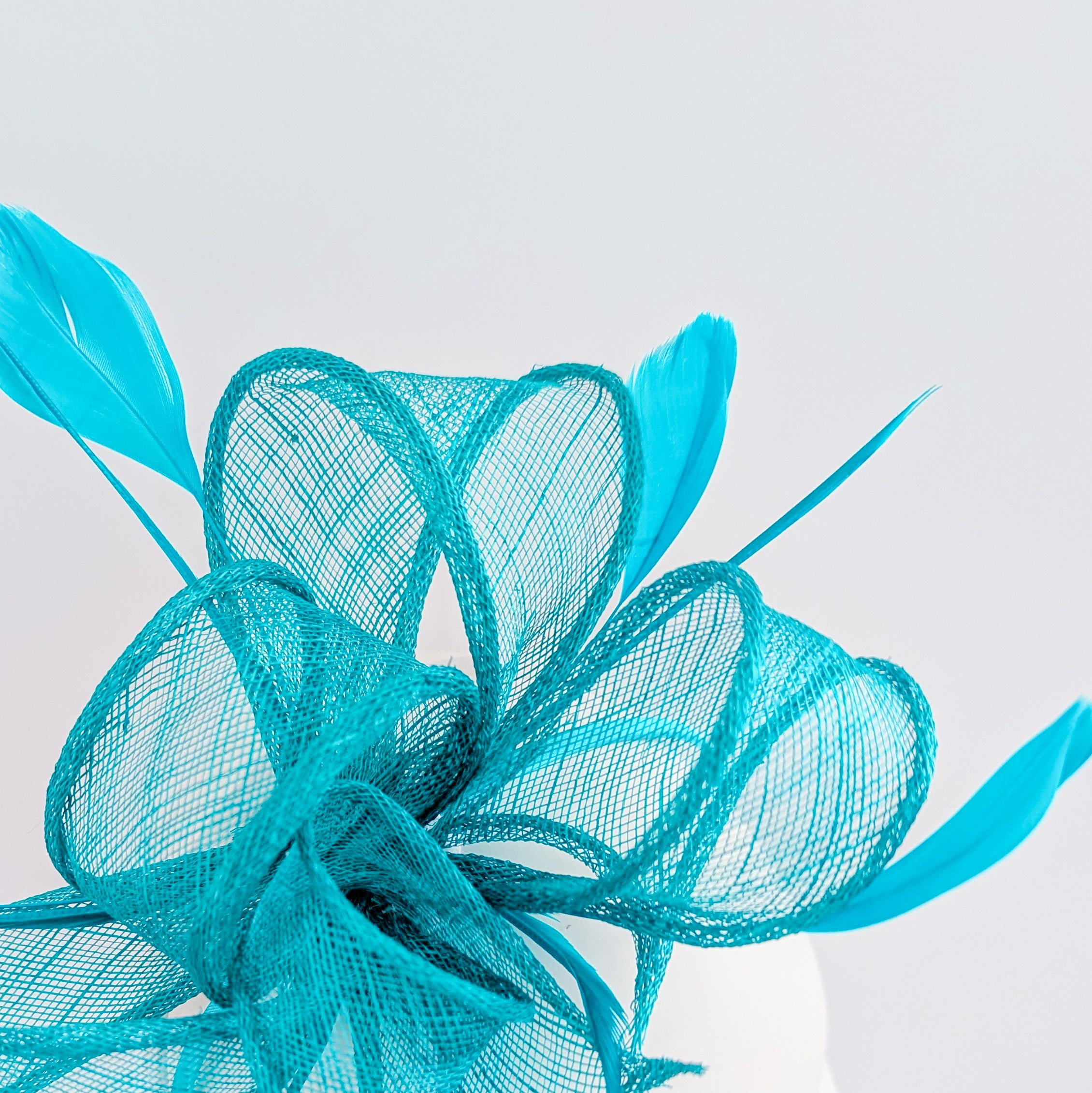 Dark acqua blue feather fascinator hat