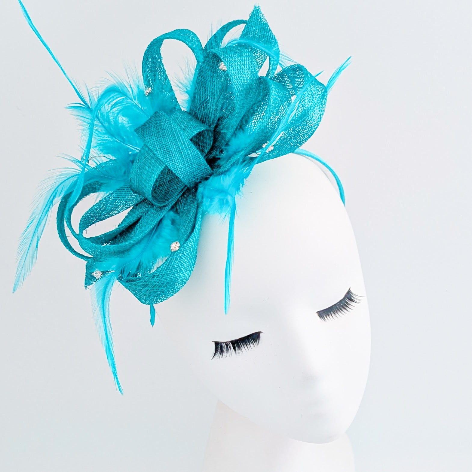 Dark aqua blue crystal feather fascinator hat
