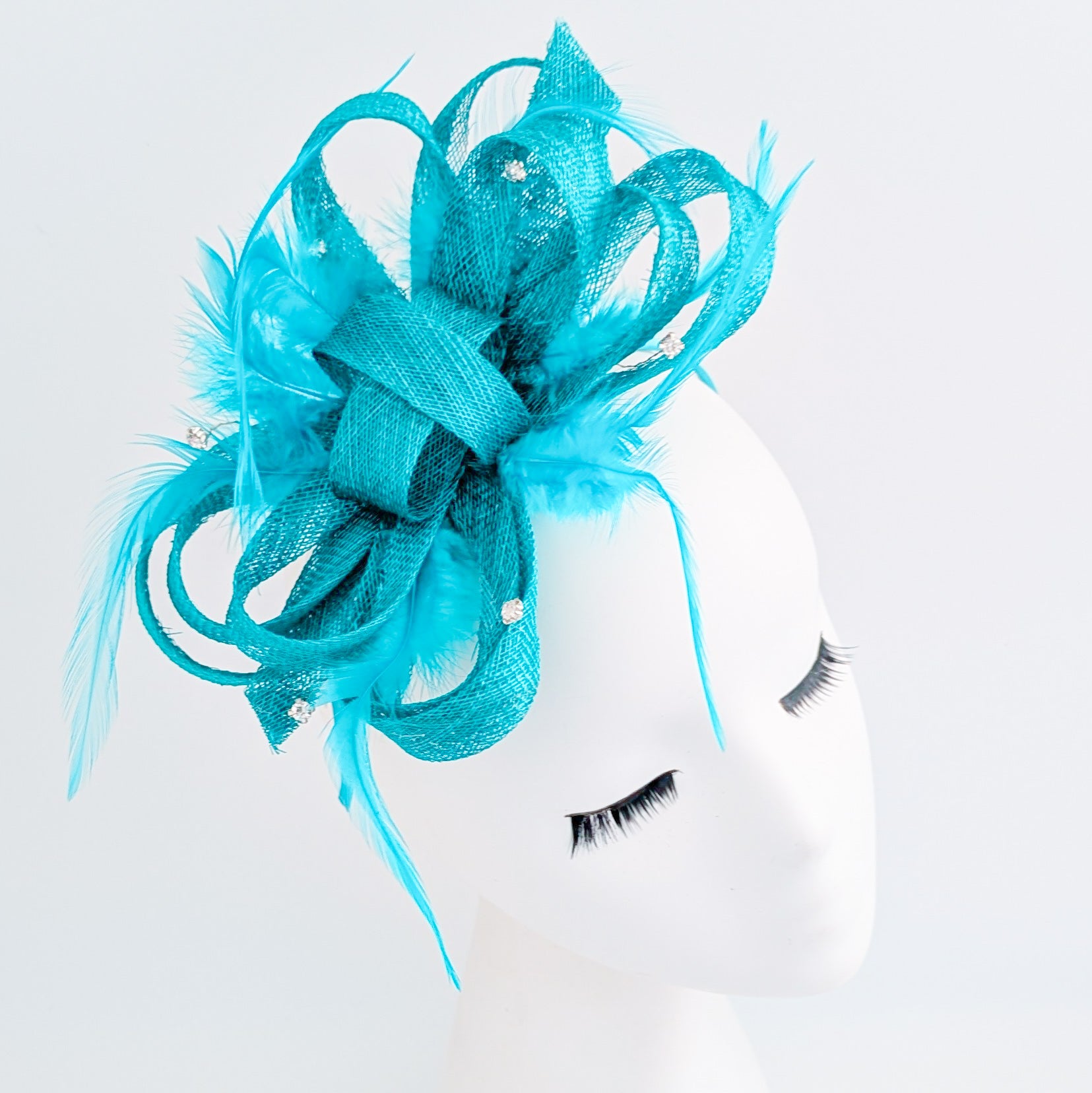 Dark aqua blue crystal feather fascinator hat