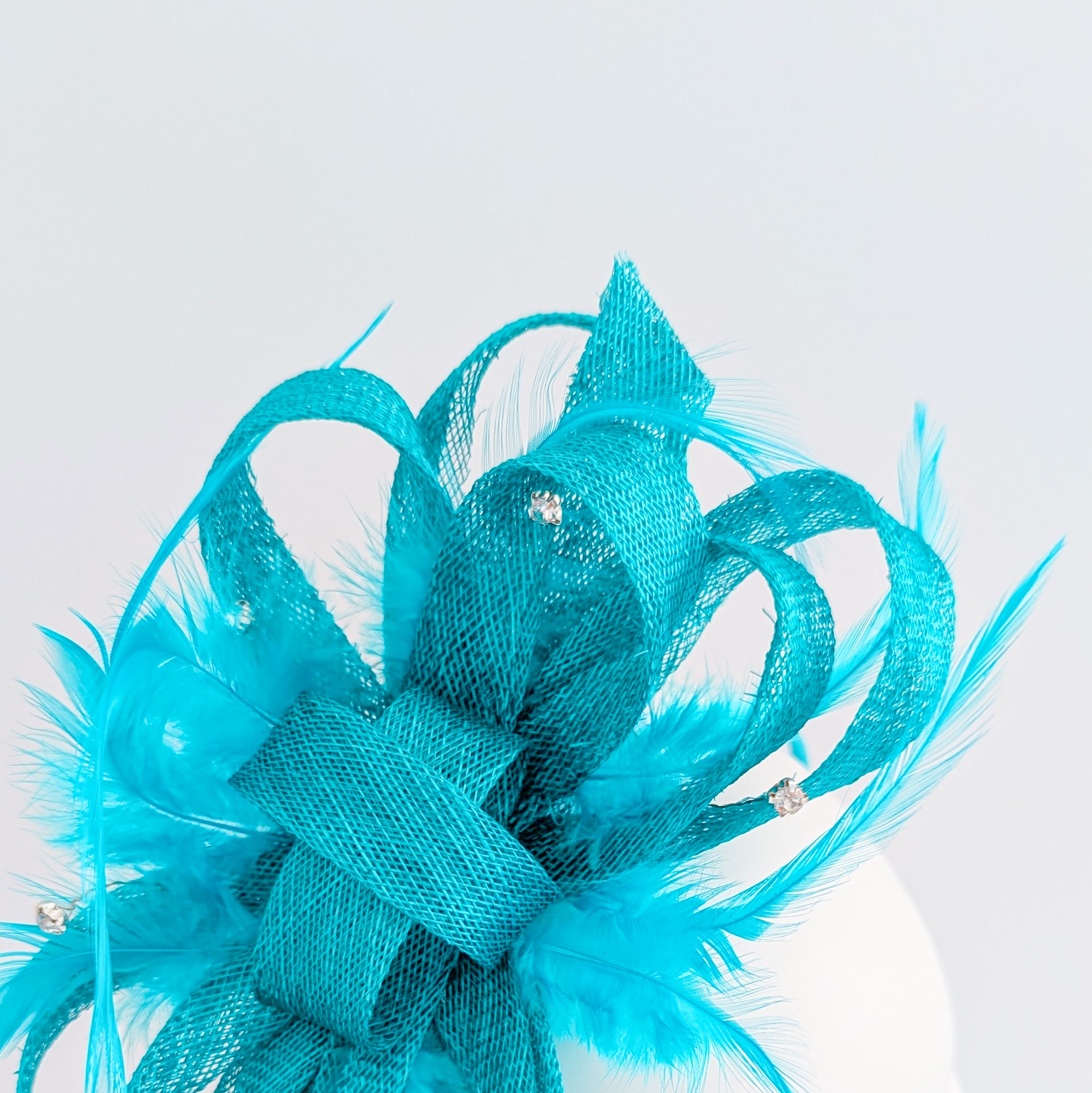 Dark aqua blue crystal feather fascinator hat