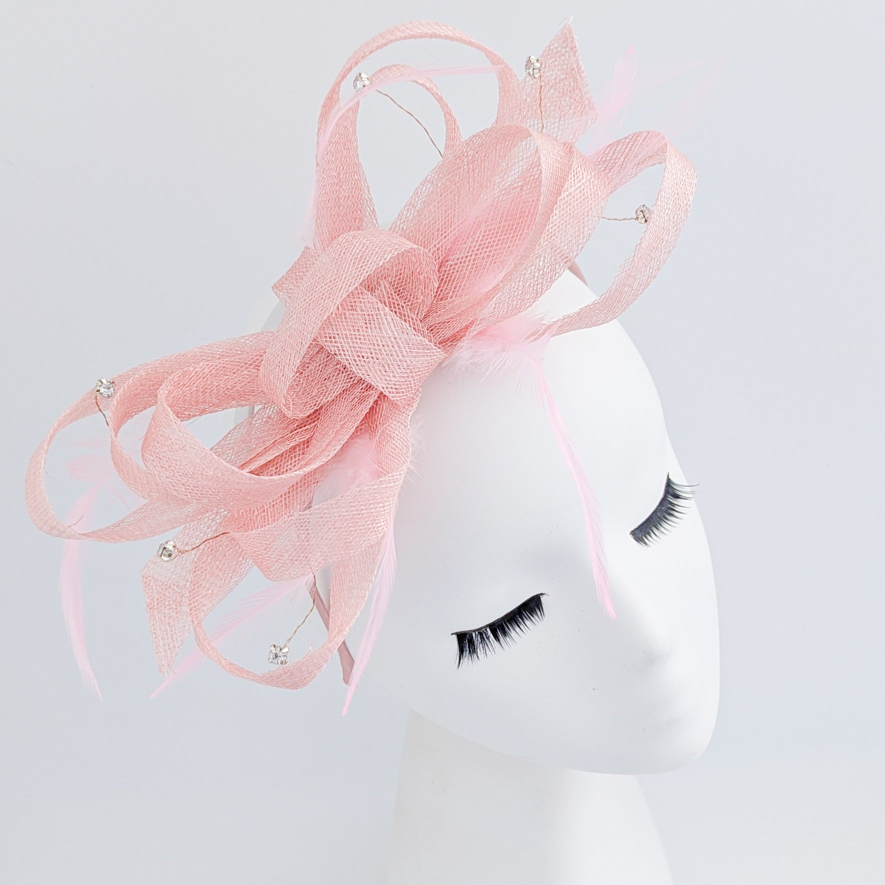 Light pink crystal feather fascinator hat