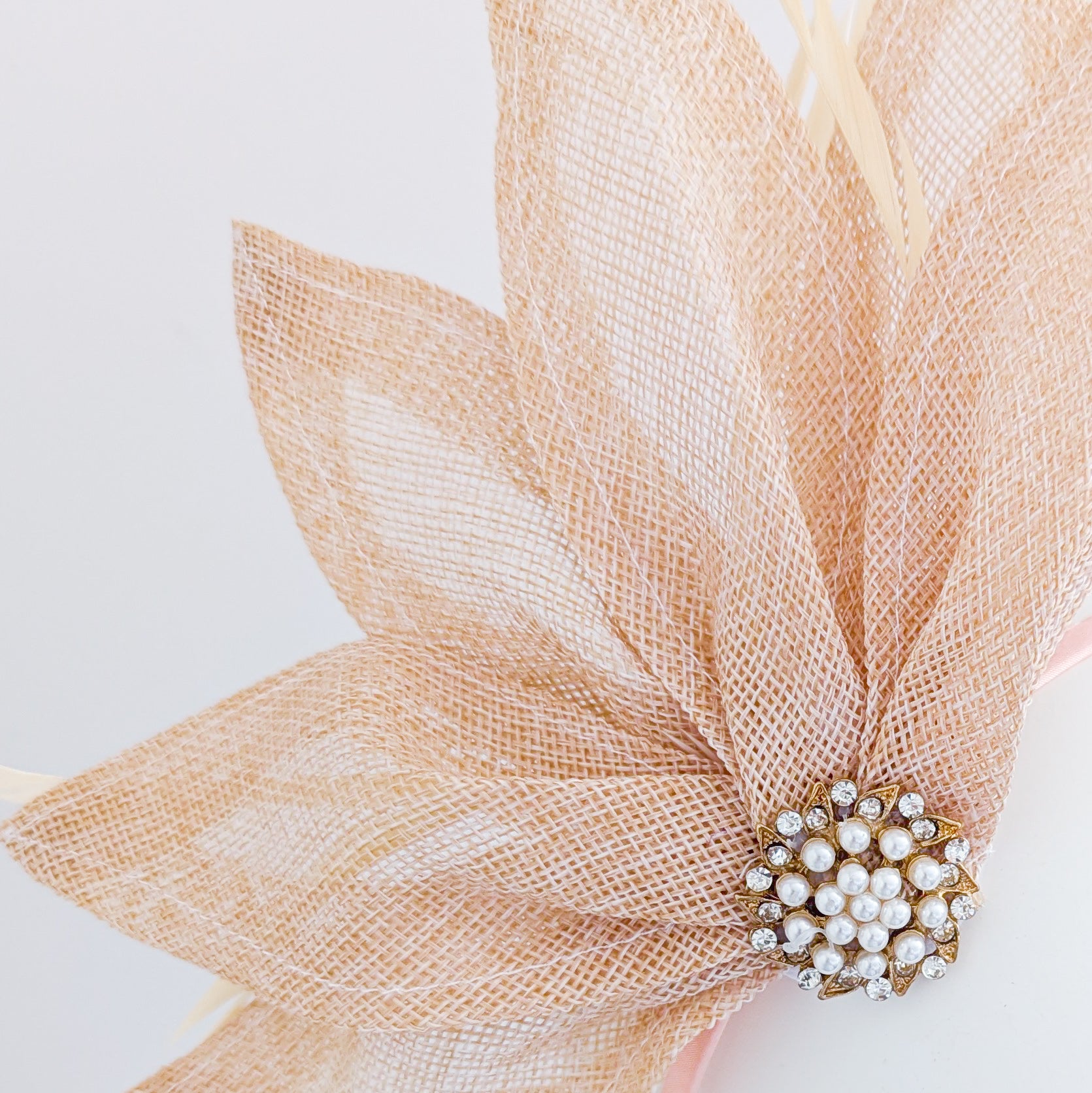 Beige peach feather petal fan fascinator hat