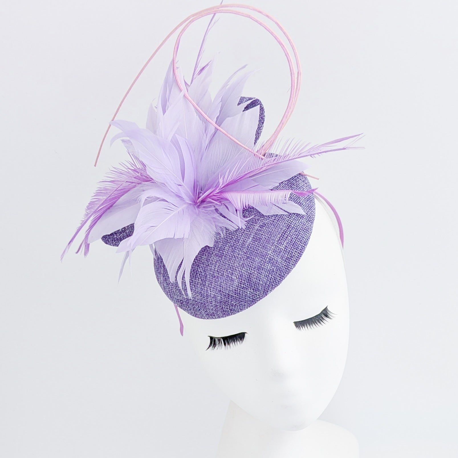 Lavender and lilac purple feather fascinator hat