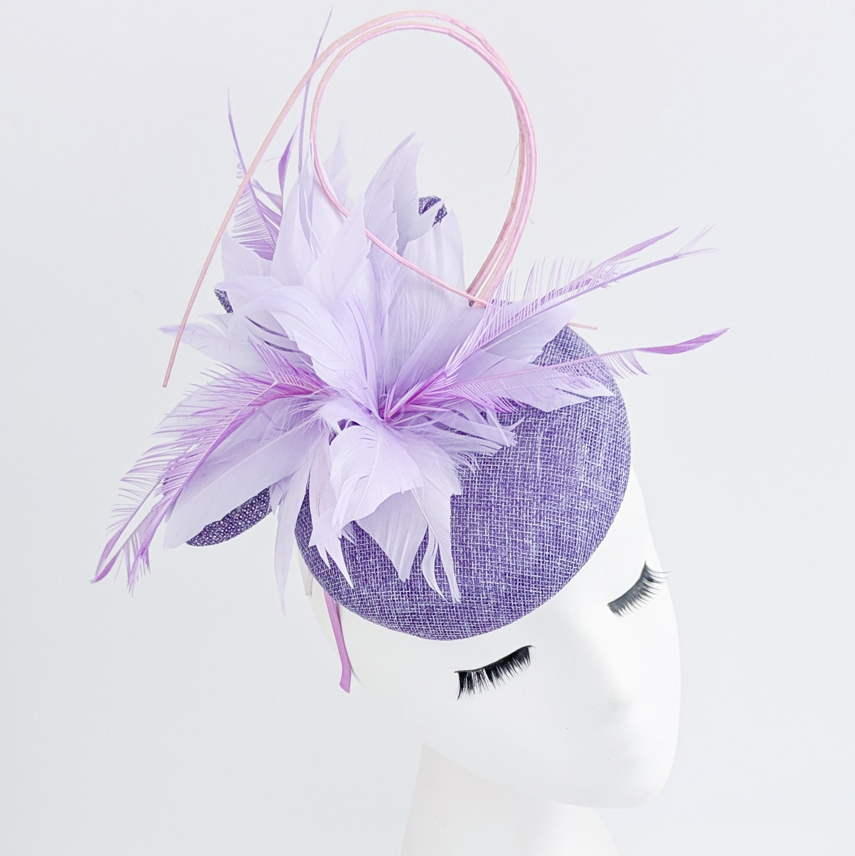 Lavender and lilac purple feather fascinator hat