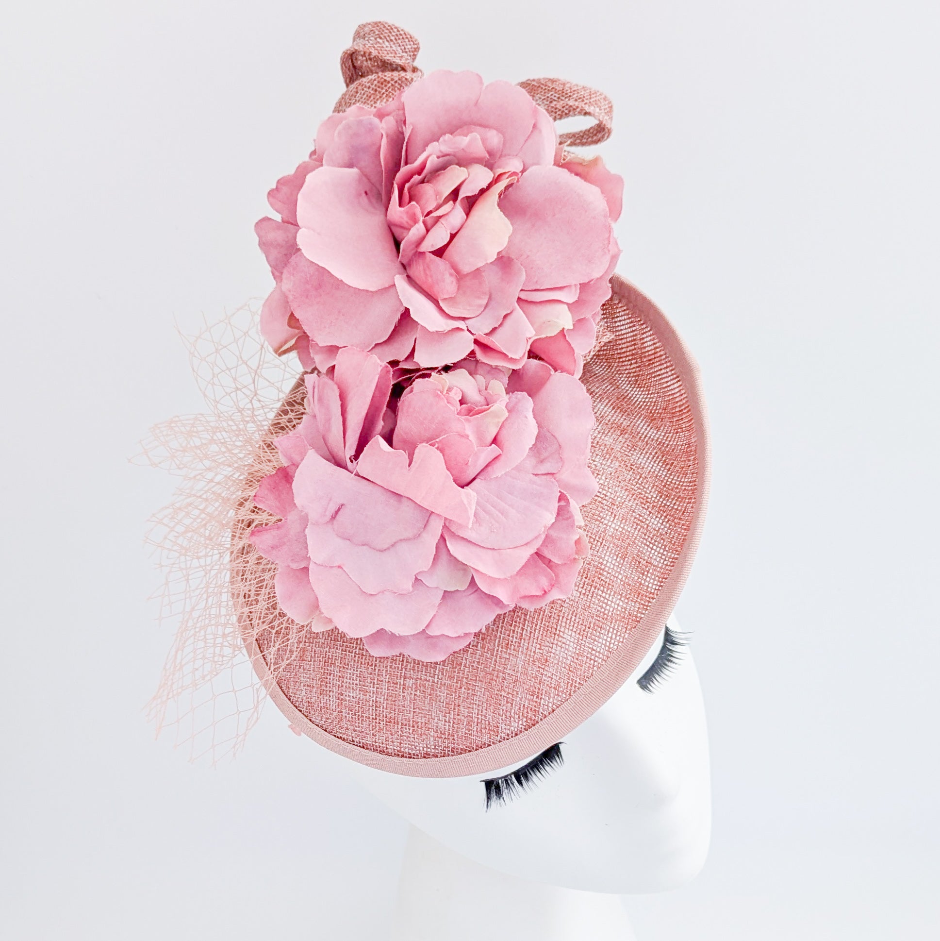 Blush pink flower fascinator disc saucer hat