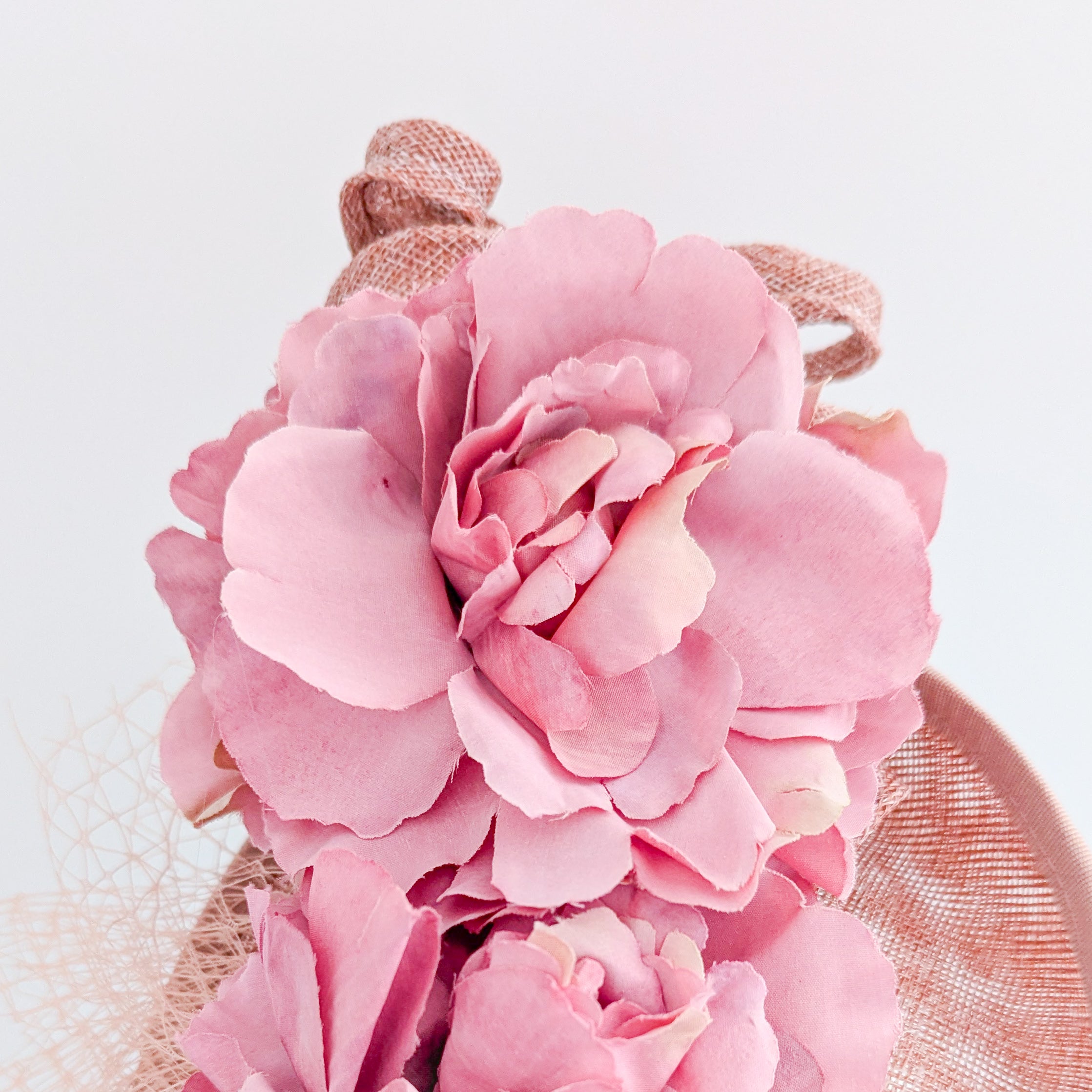Blush pink flower fascinator disc saucer hat
