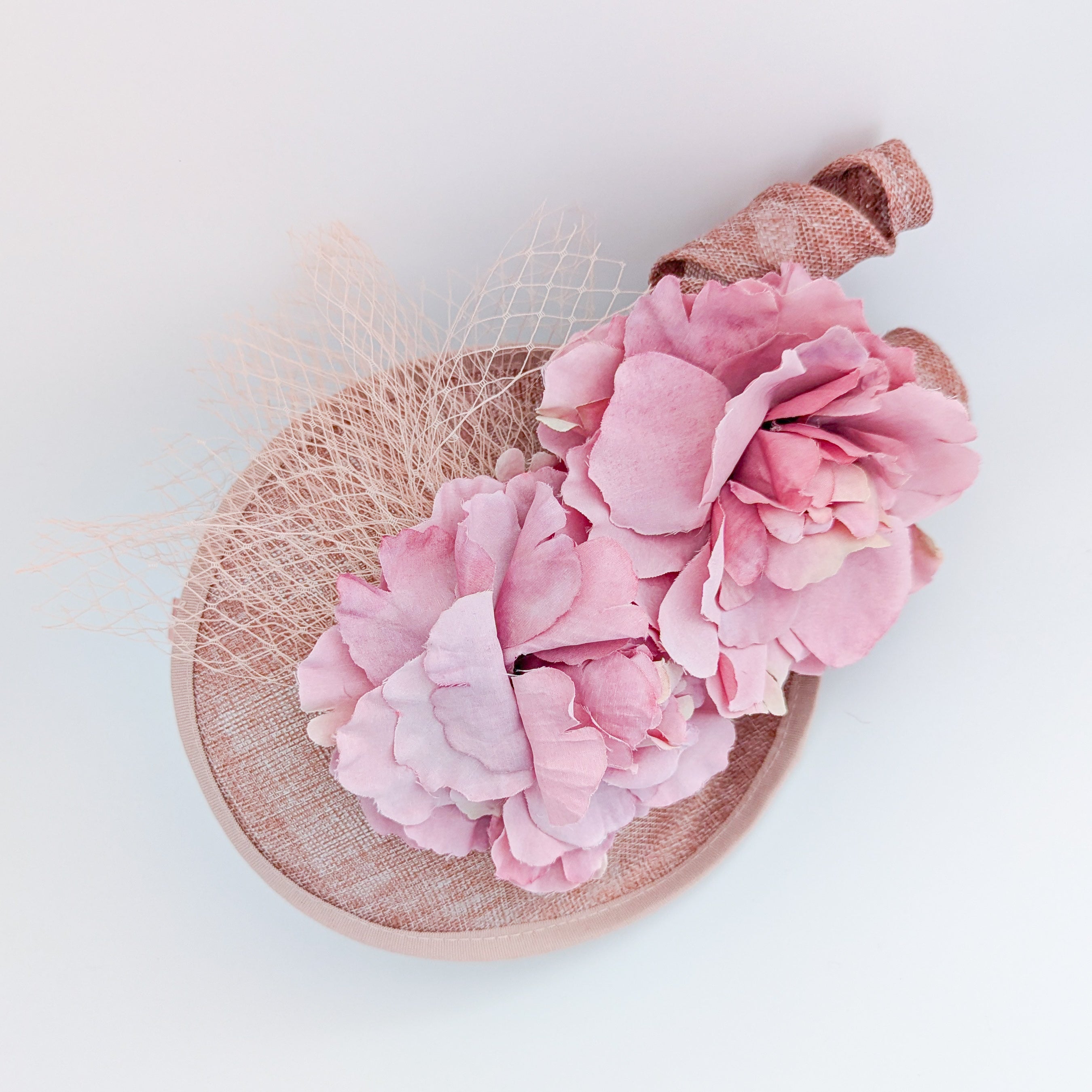 Blush pink flower fascinator disc saucer hat