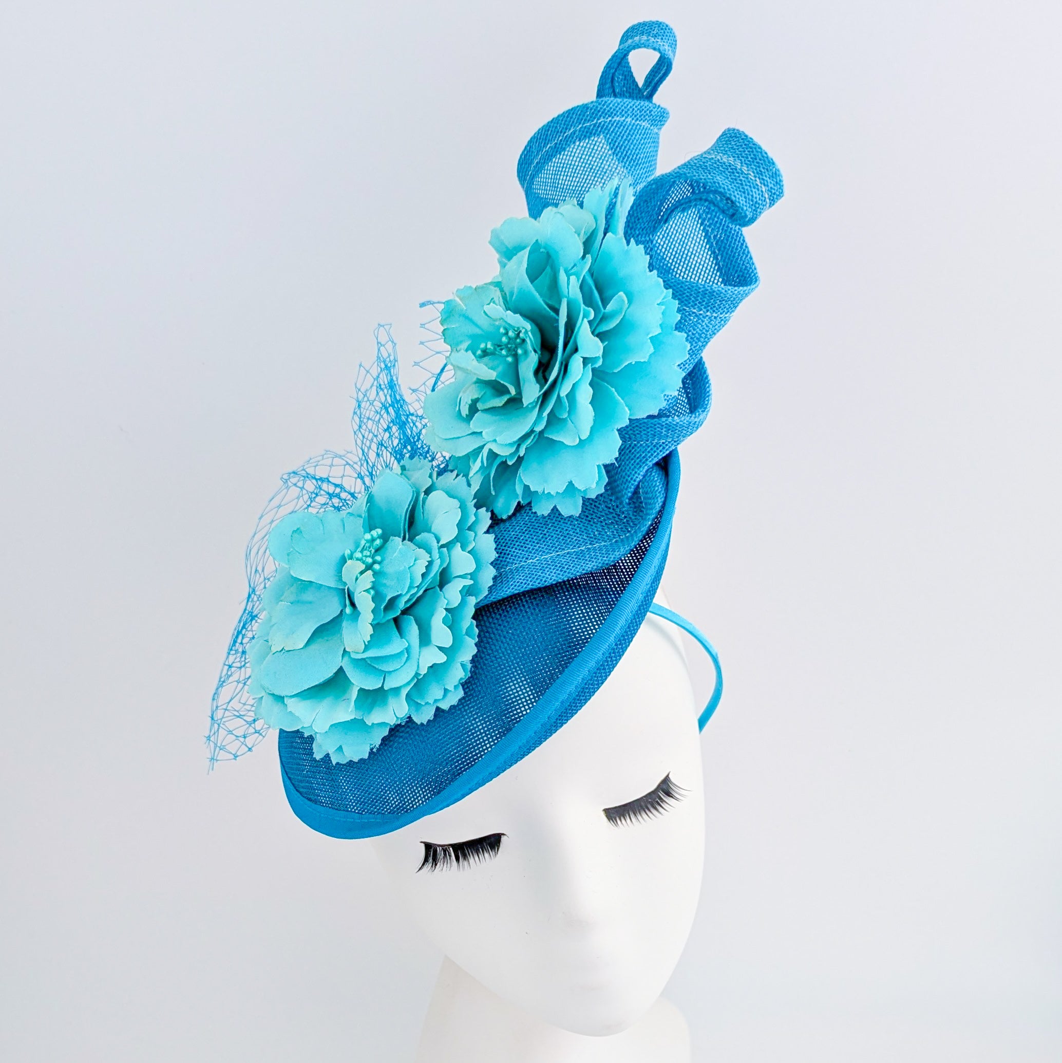 Sea blue flower fascinator disc saucer hat