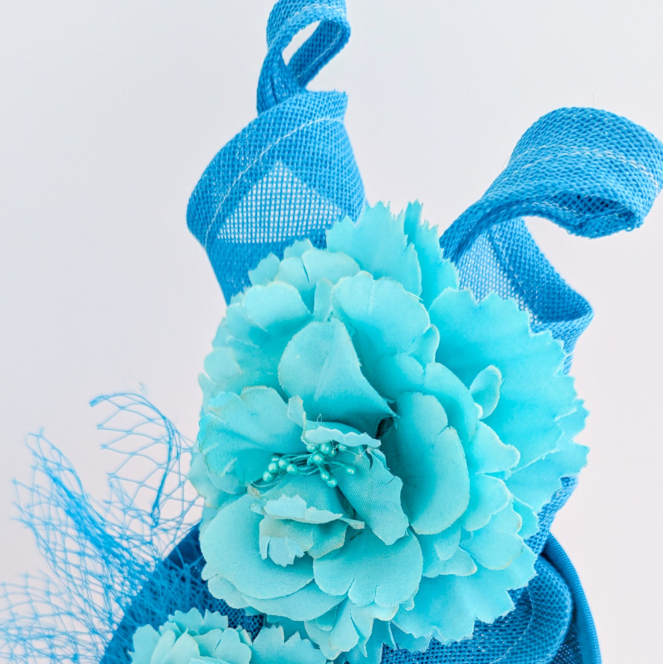 Sea blue flower fascinator disc saucer hat