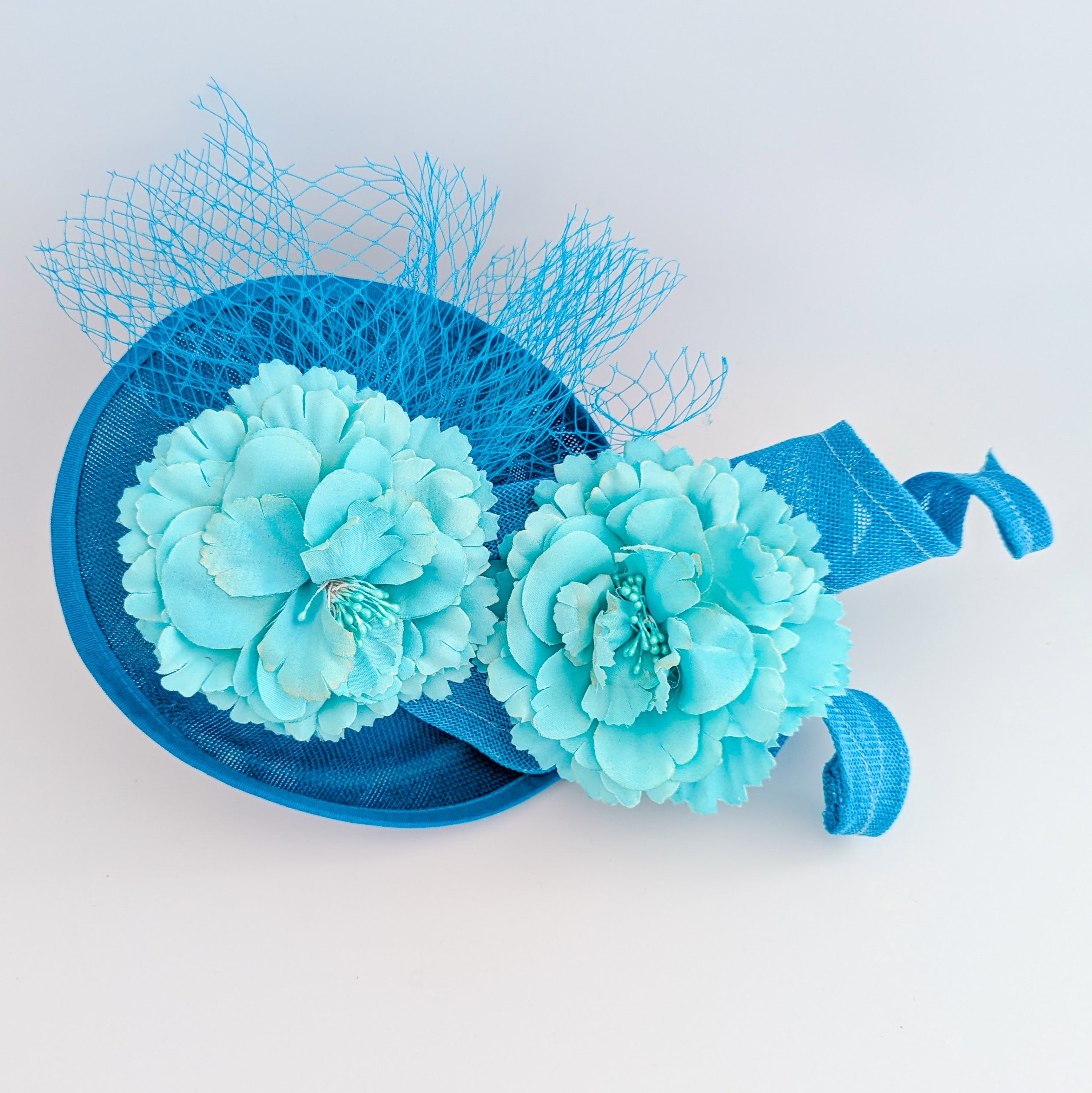 Sea blue flower fascinator disc saucer hat