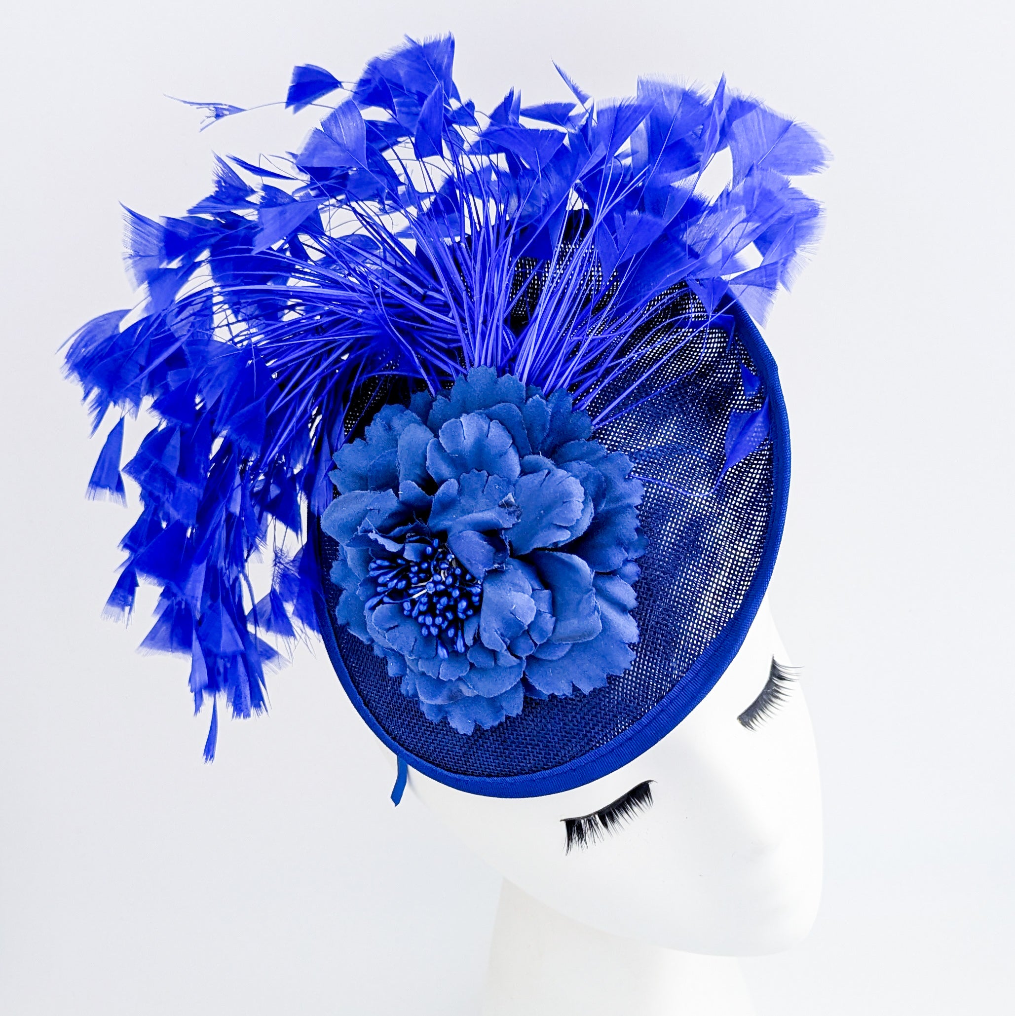 Royal cobalt blue flower feather disc saucer fascinator hat