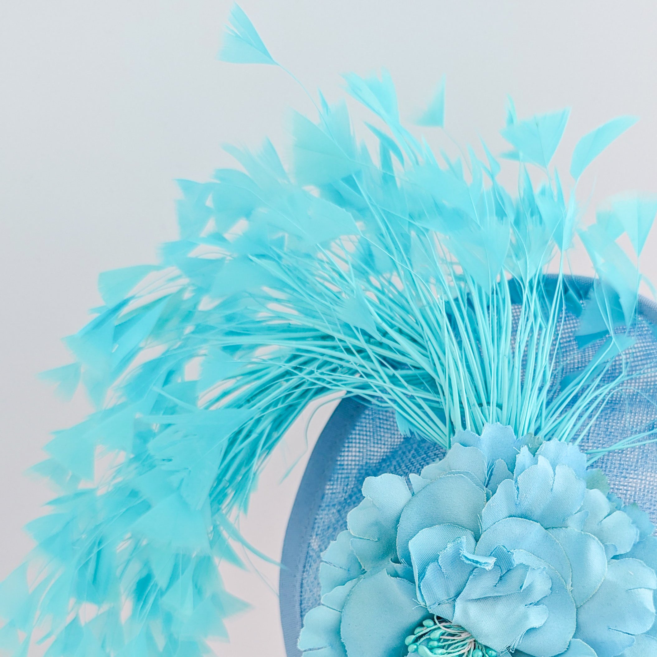 Light cornflower blue flower feather disc saucer fascinator hat