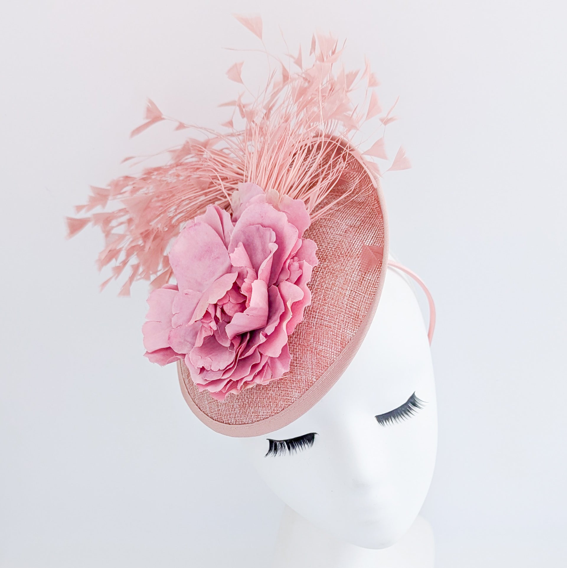 Blush pink flower feather disc saucer fascinator hat