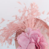 Blush pink flower feather disc saucer fascinator hat