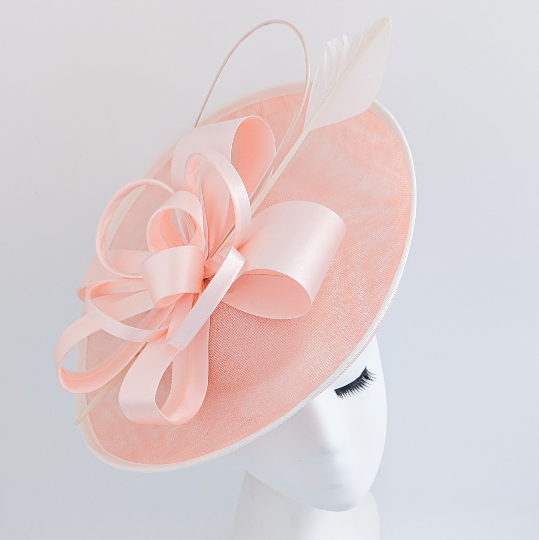 Light pink feather large saucer disc fascinator hat