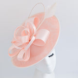 Light pink feather large saucer disc fascinator hat