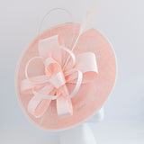 Light pink feather large saucer disc fascinator hat