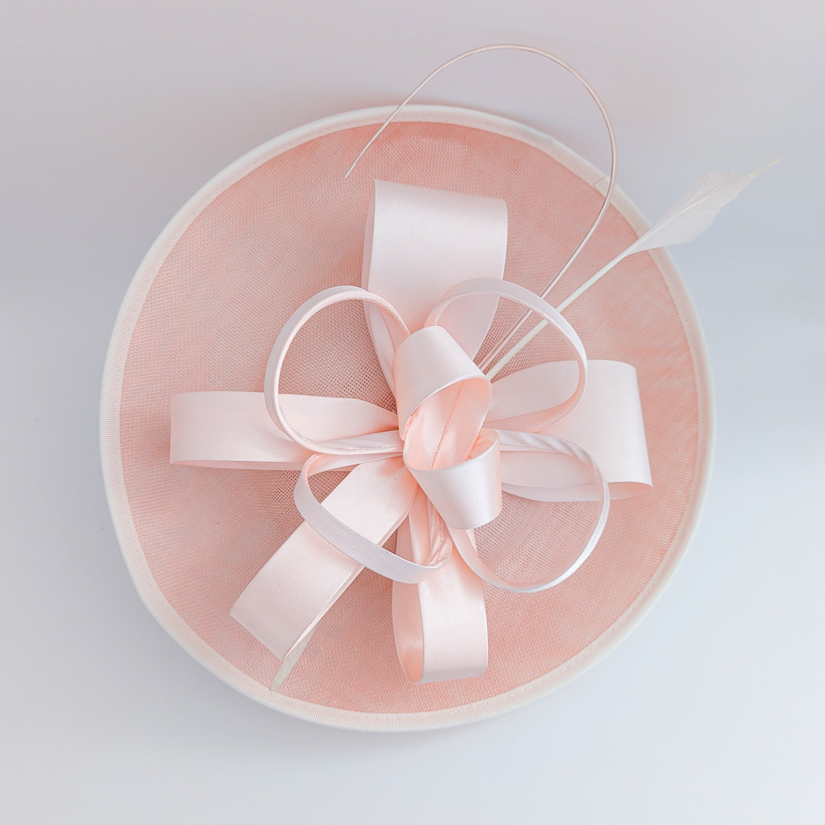 Light pink feather large saucer disc fascinator hat