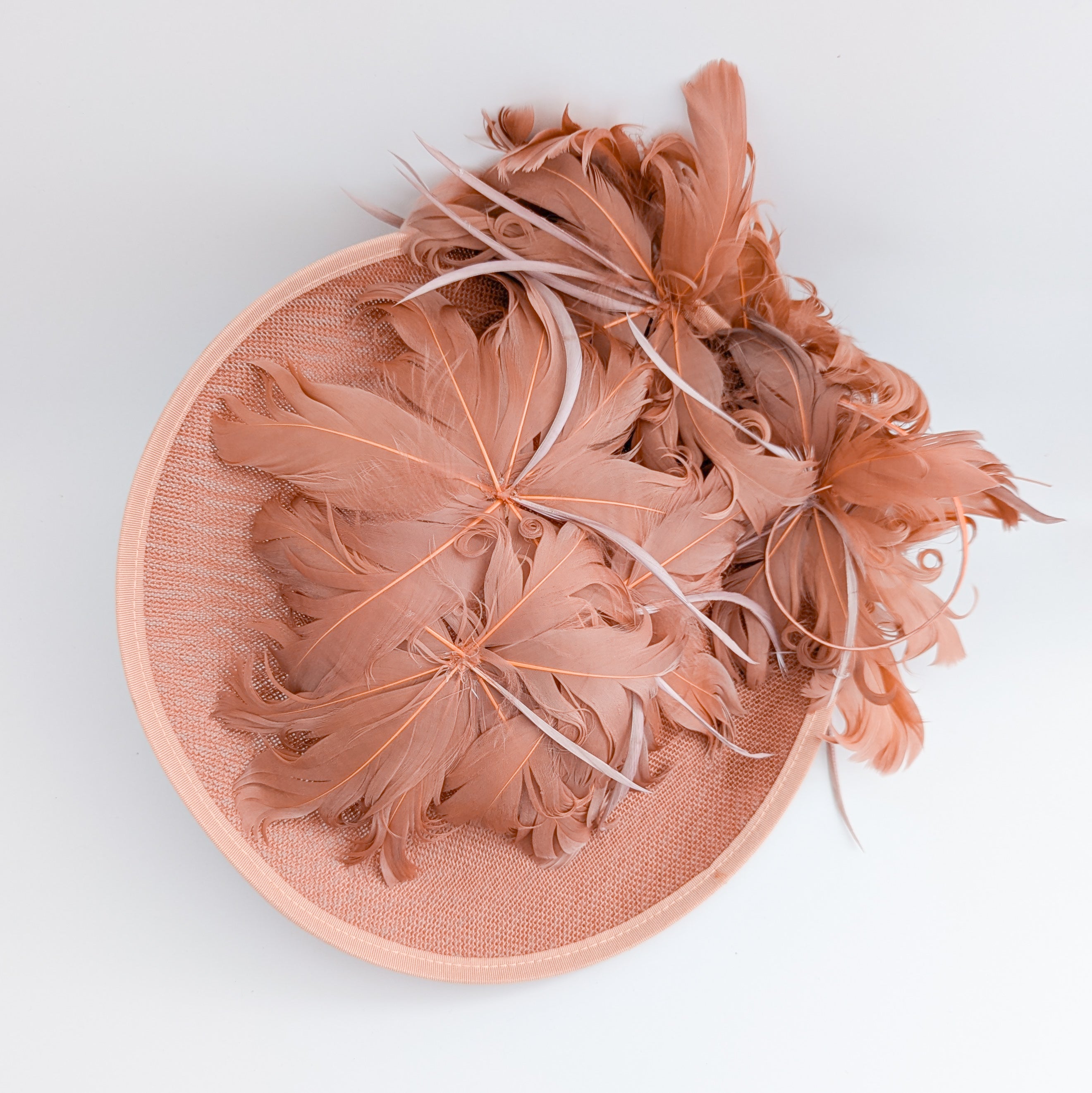 Terracotta dusty pink large feather saucer disc fascinator hat