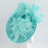 Light turquoise green blue large feather saucer disc fascinator hat
