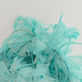 Light turquoise green blue large feather saucer disc fascinator hat