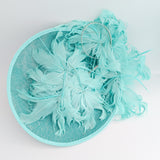 Light turquoise green blue large feather saucer disc fascinator hat