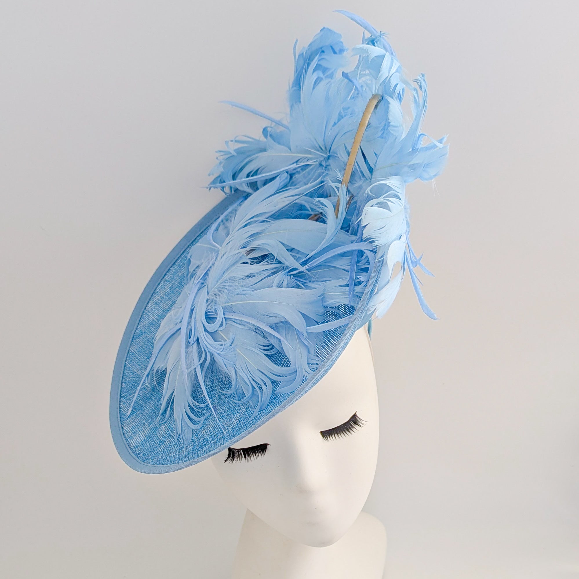Light cornflower blue large feather saucer disc fascinator hat
