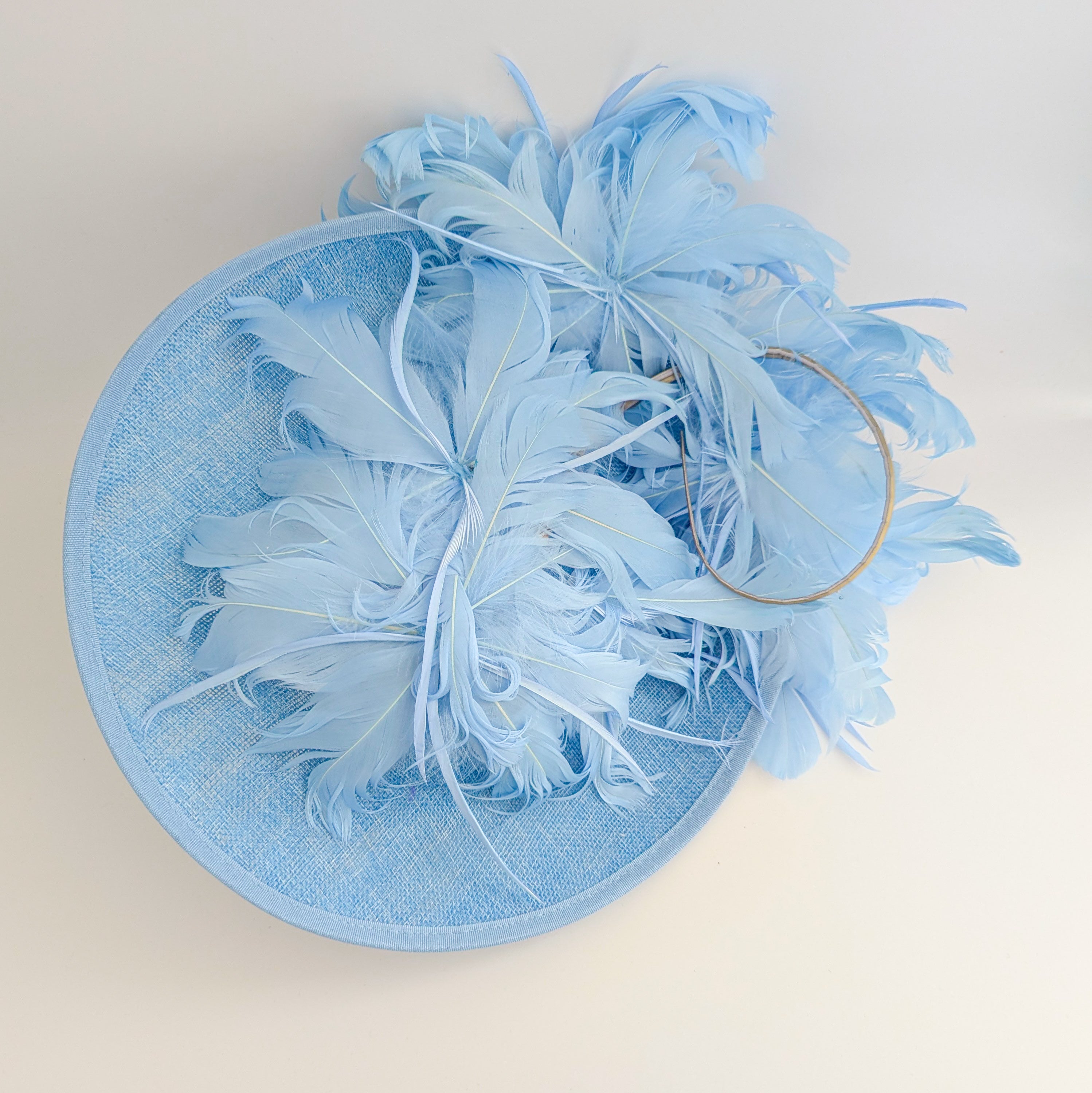Light cornflower blue large feather saucer disc fascinator hat