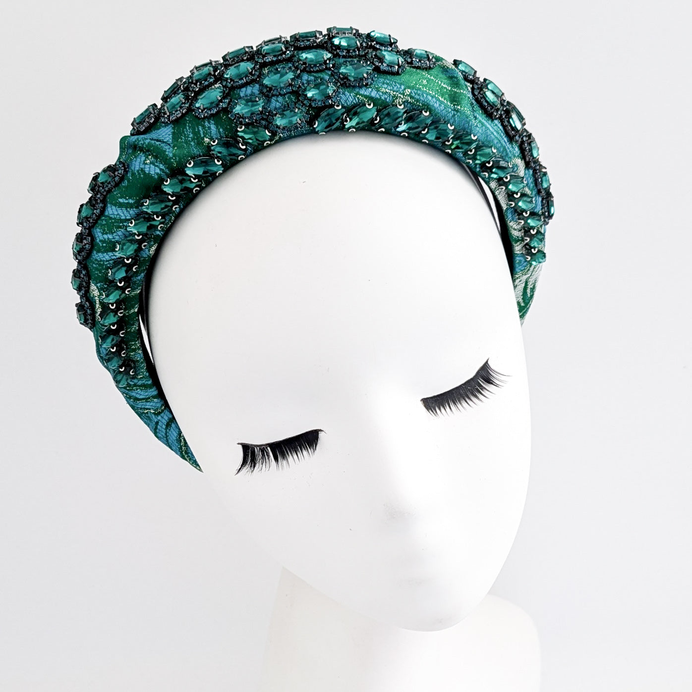 Emerald green crystal padded satin headband fascinator