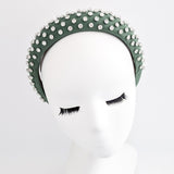 Dark sage green crystal padded headband fascinator