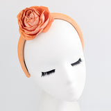 Light orange flower padded velvet headband fascinator