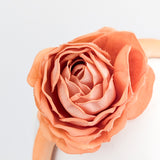 Light orange flower padded velvet headband fascinator