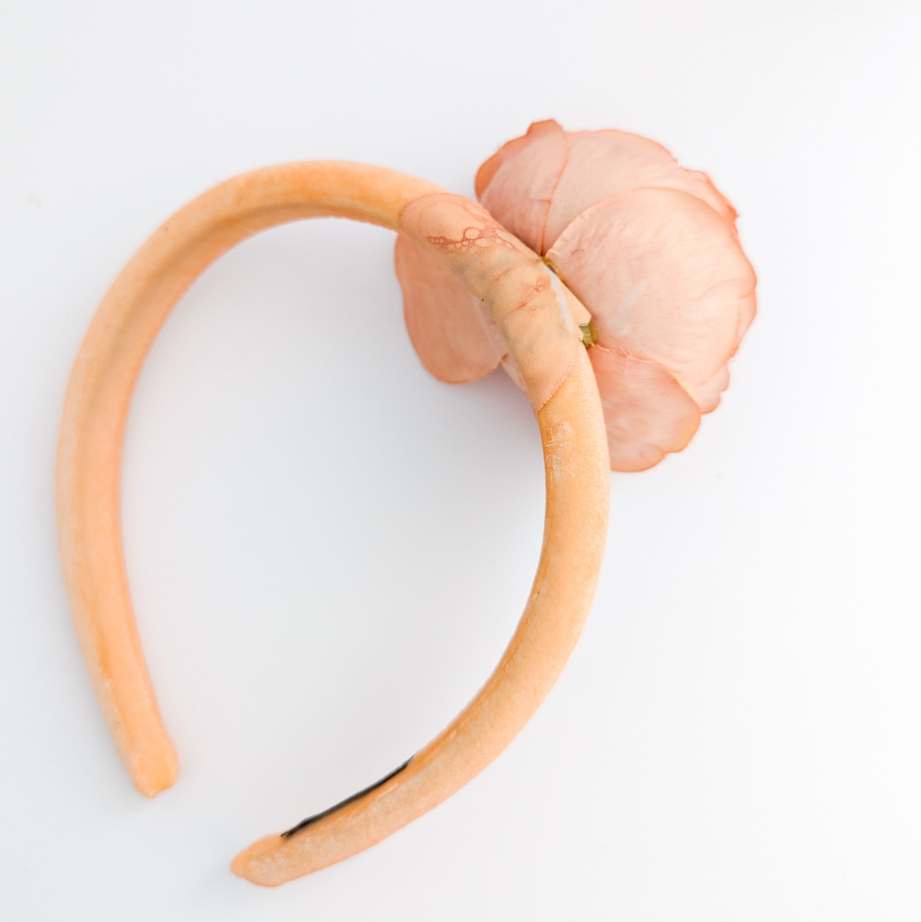 Light orange flower padded velvet headband fascinator