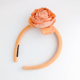 Light orange flower padded velvet headband fascinator