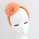 Light orange flower padded velvet headband fascinator