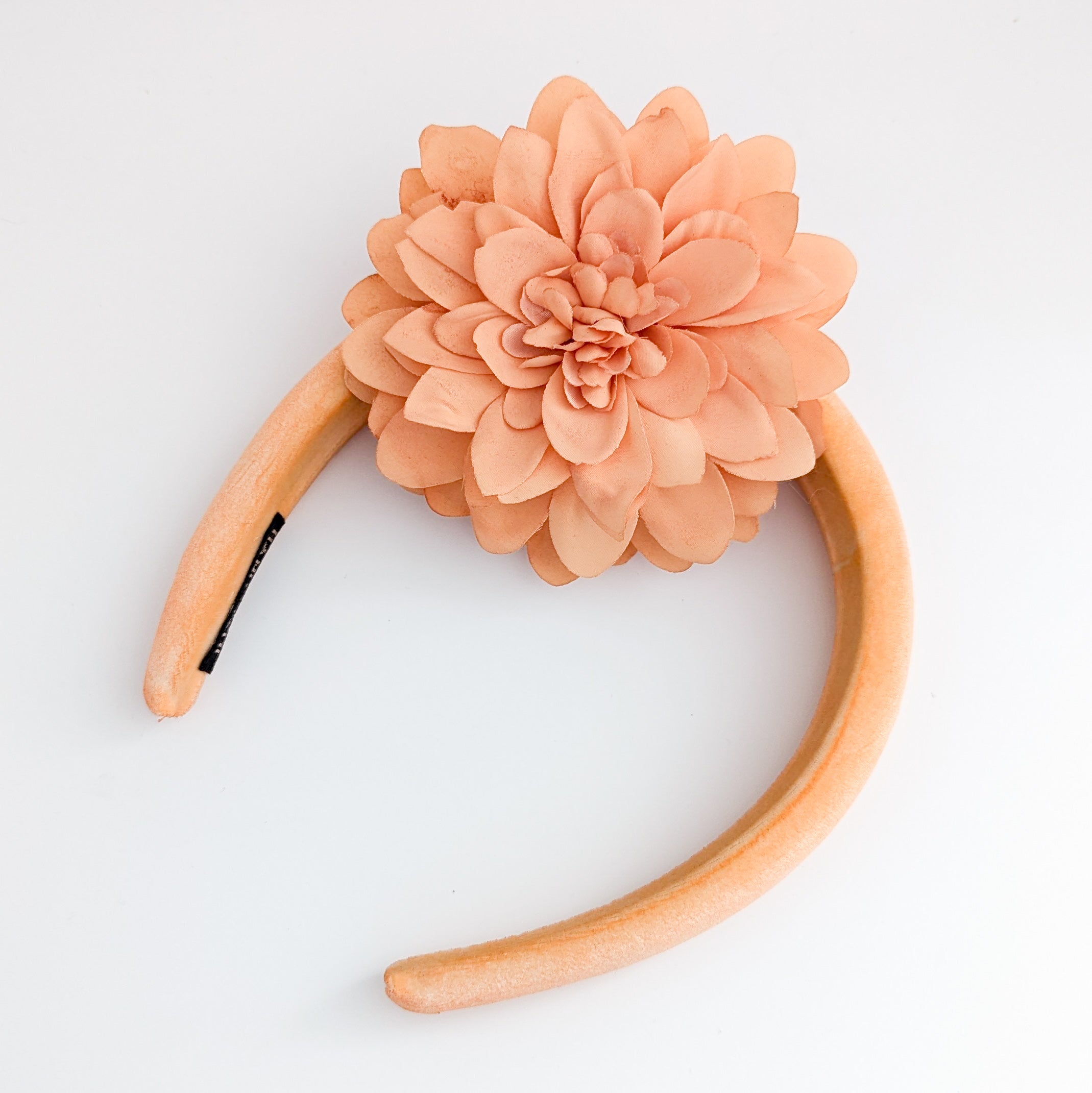 Light orange flower padded velvet headband fascinator