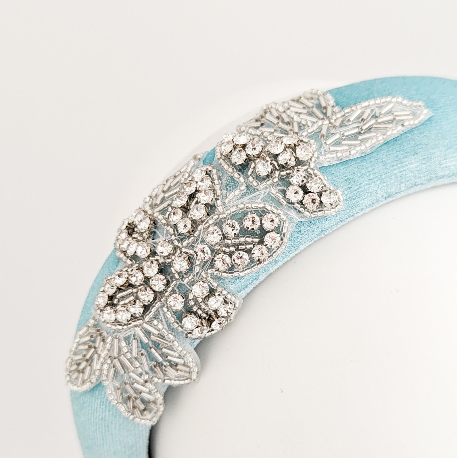 Sky blue crystal padded velvet headband fascinator