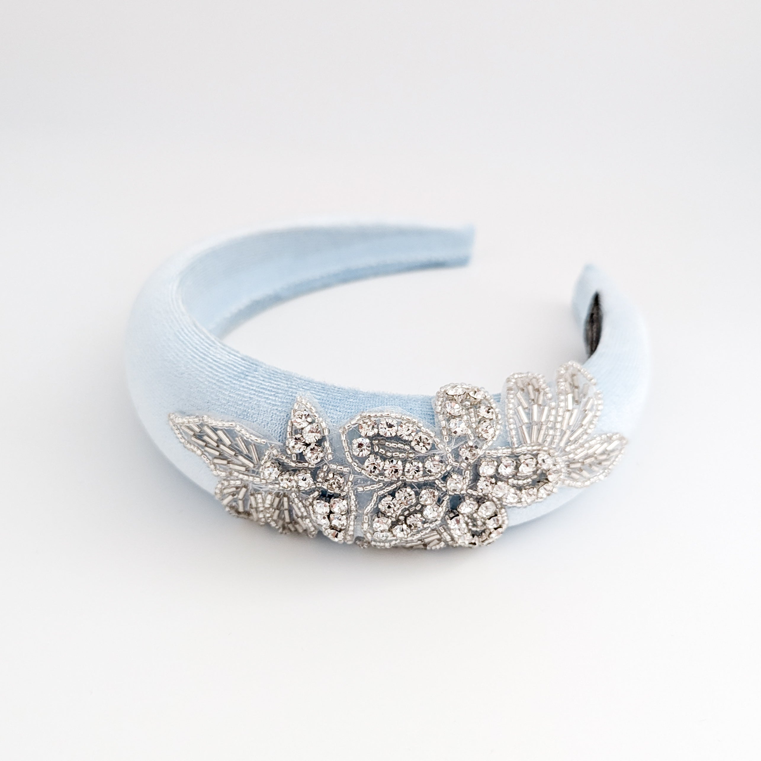 Light baby blue crystal padded velvet headband fascinator