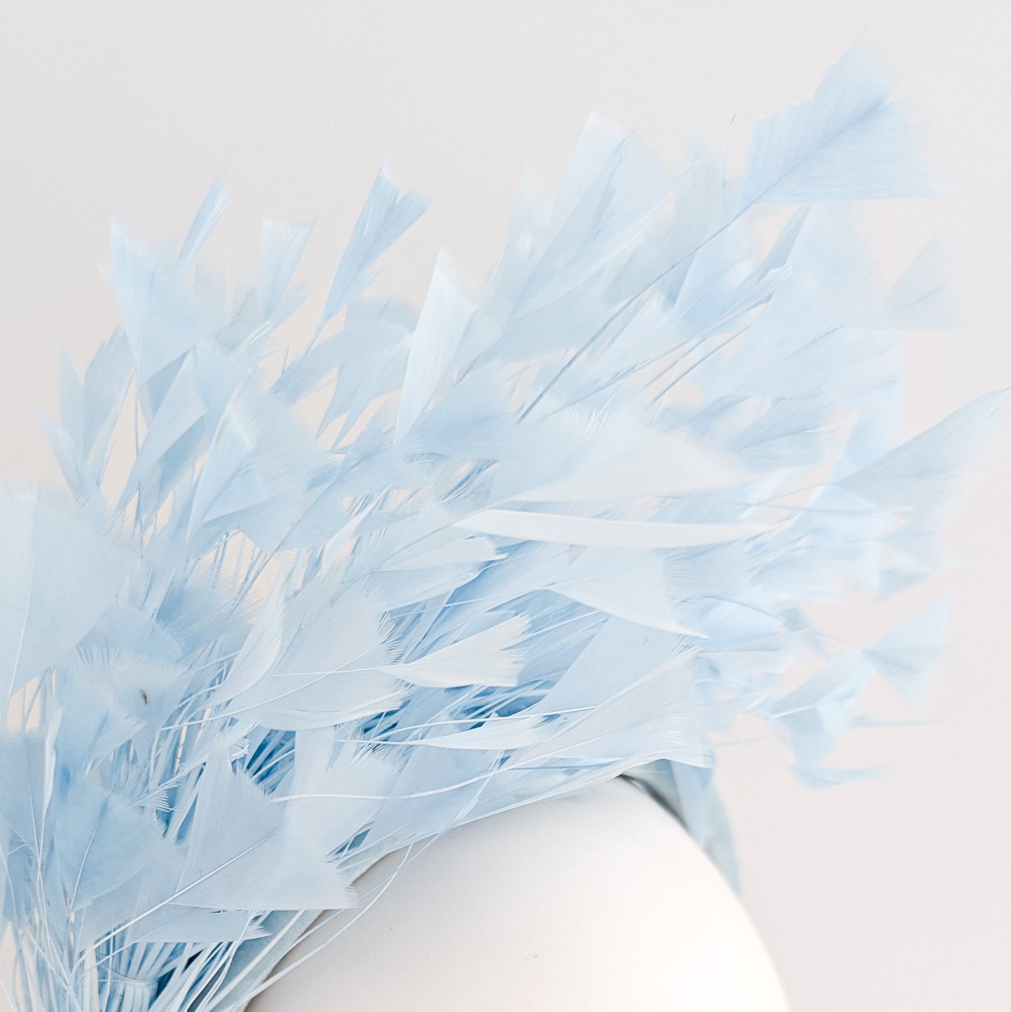 Light cornflower blue feather padded velvet headband fascinator