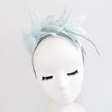 Light aquamarine blue feather satin headband fascinator