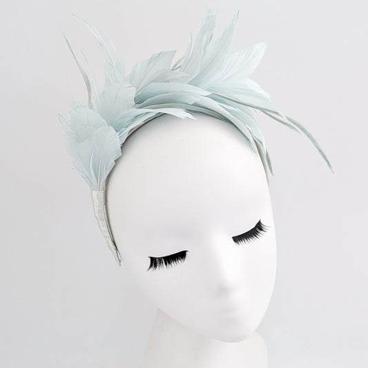 Light aquamarine blue feather satin headband fascinator