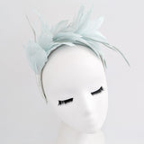 Light aquamarine blue feather satin headband fascinator