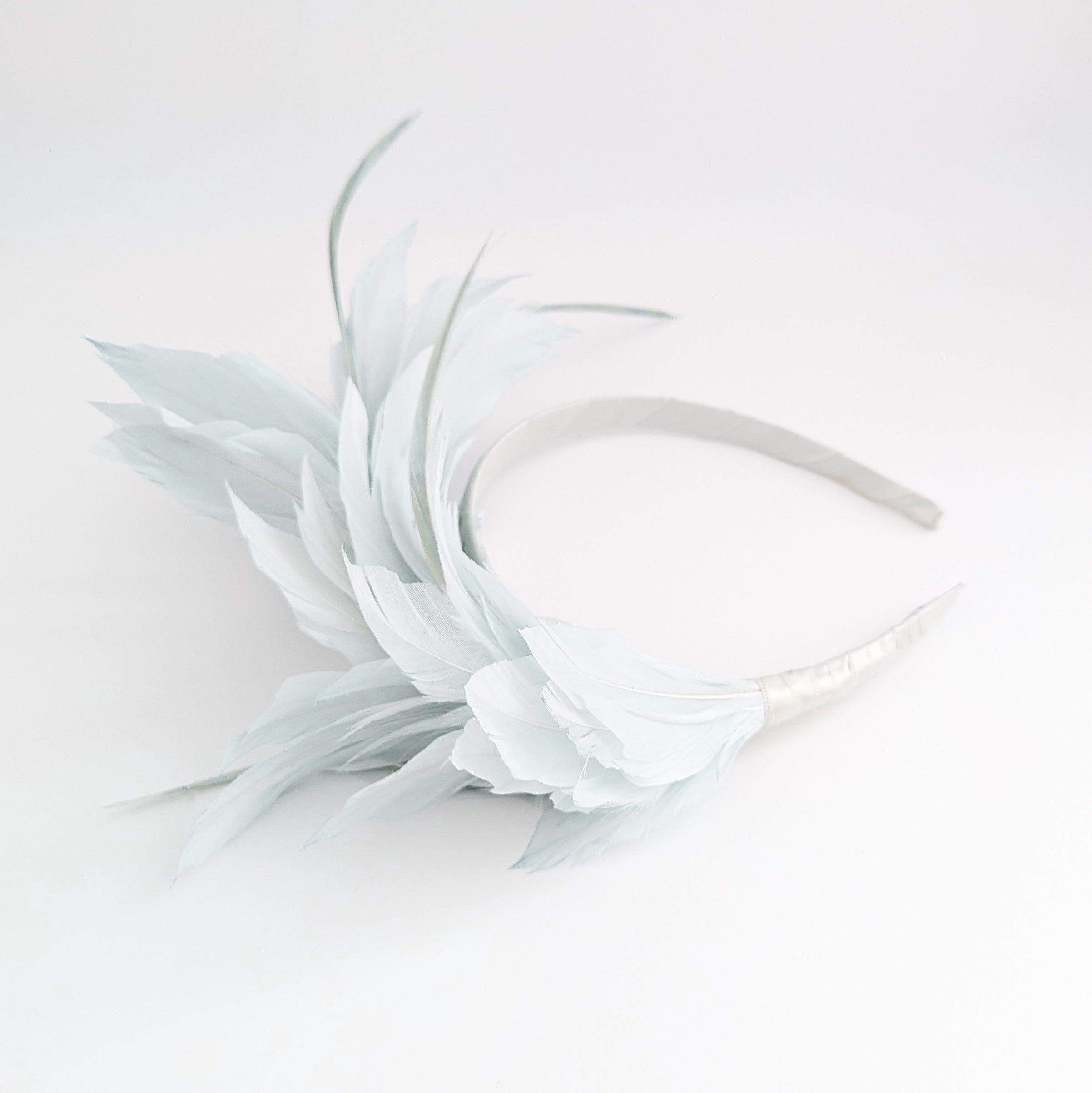 Light aquamarine blue feather satin headband fascinator
