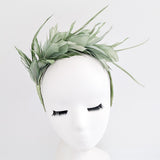 Sage green feather satin headband fascinator