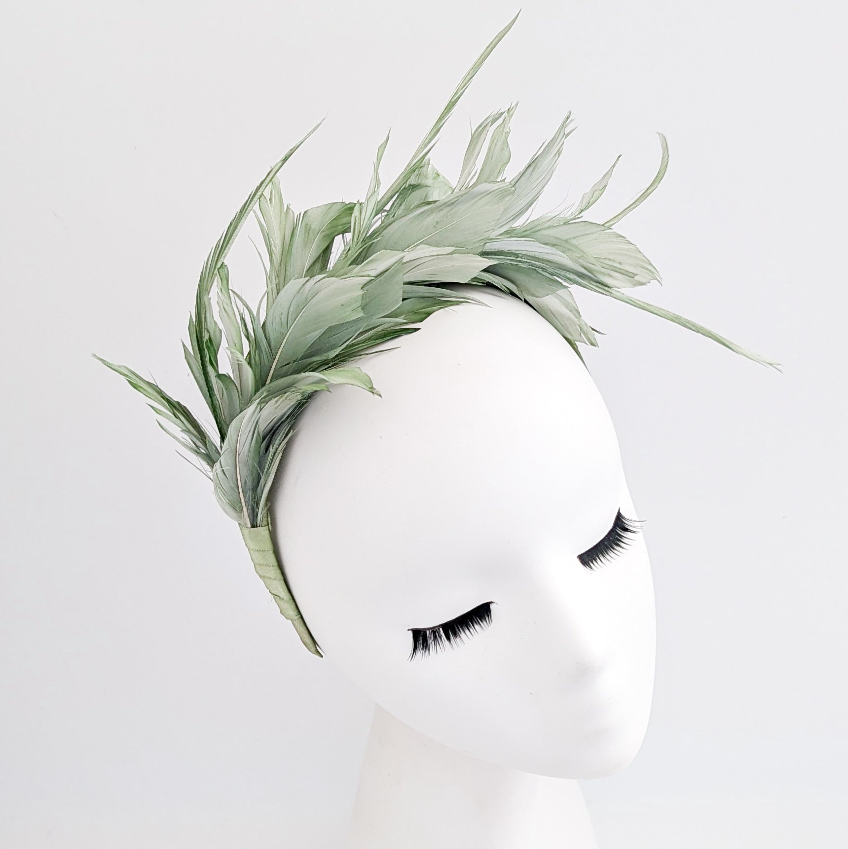 Sage green feather satin headband fascinator