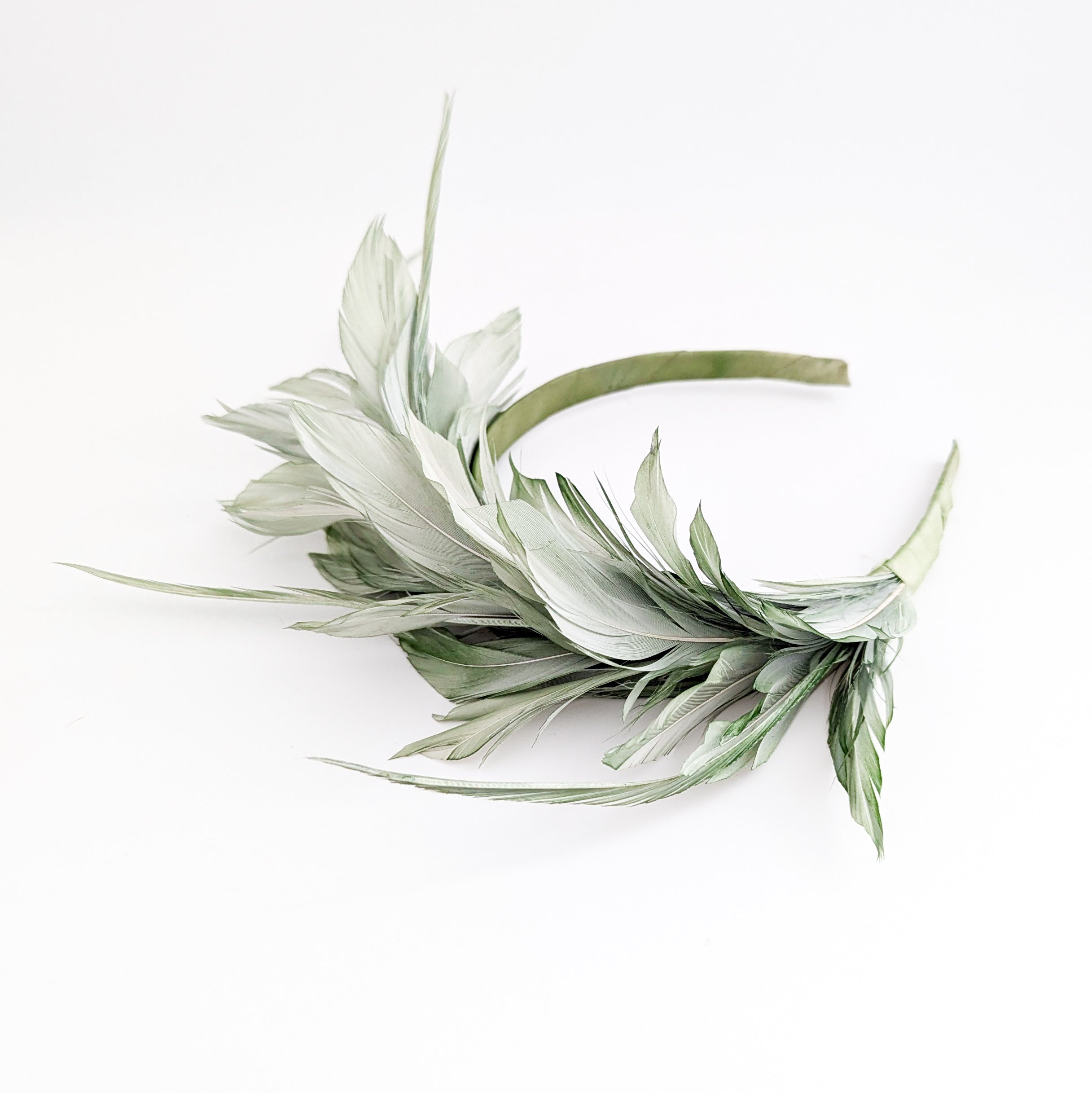 Sage green feather satin headband fascinator