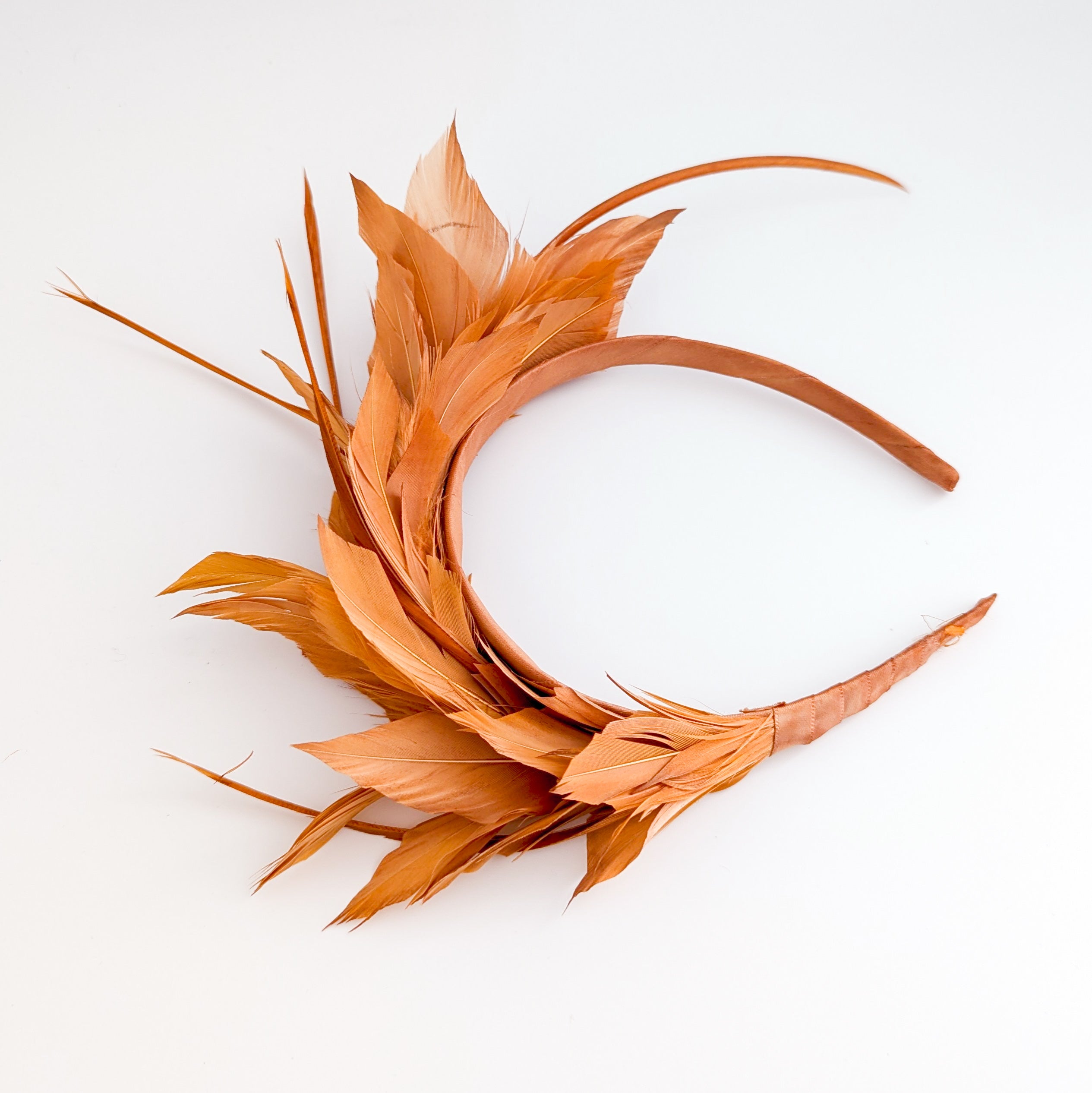 Burnt orange feather satin headband fascinator