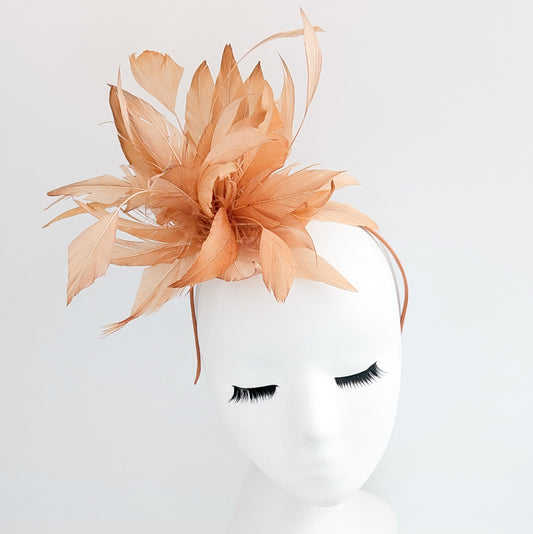 Light orange ombre feather fascinator hat
