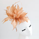 Light orange ombre feather fascinator hat